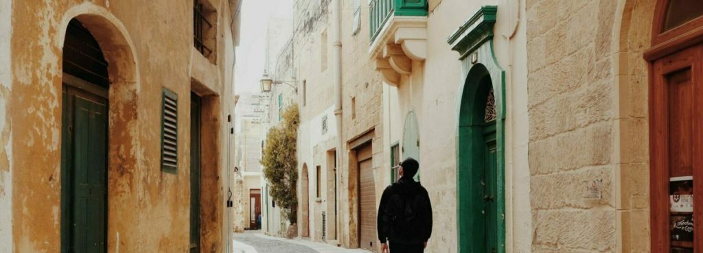 student walking through Italian streets